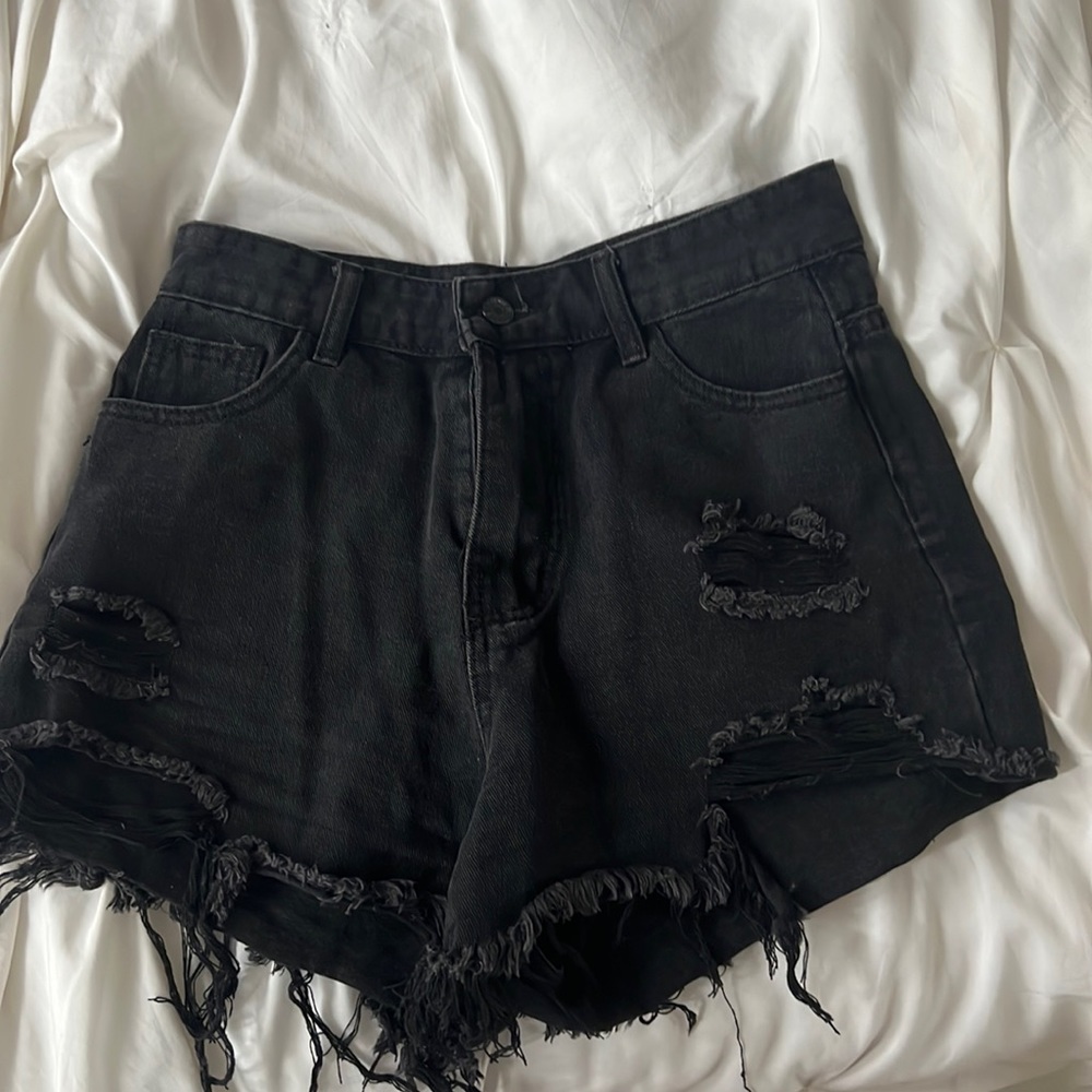 Distressed black denim shorts